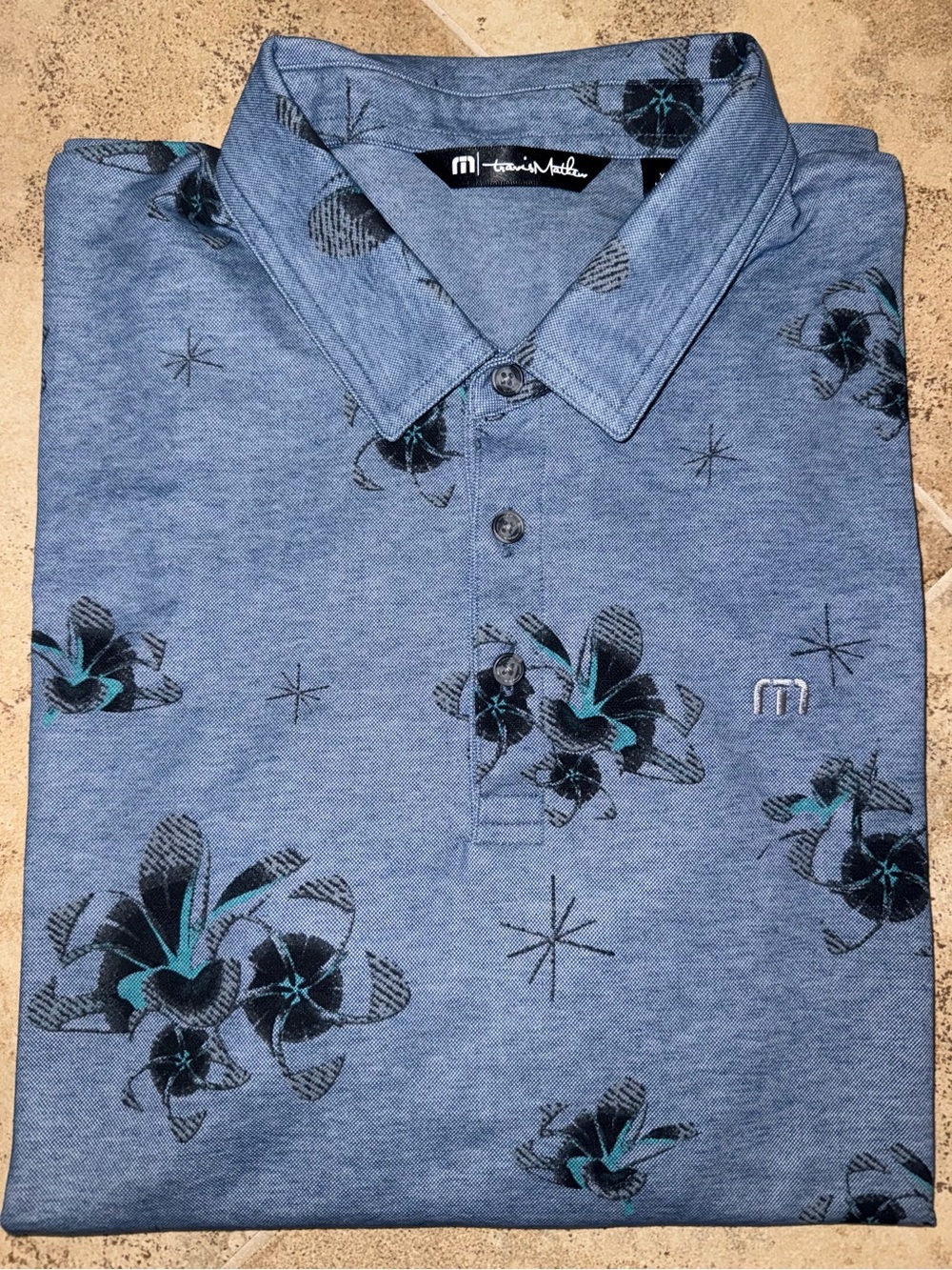 Travis Mathew Heather Blue Floral Polo with Teal Accents